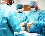 Should surgeons operate naked to prevent the spread of germs?
