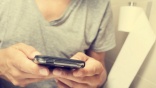 One in three UK workers use their phone on the toilet